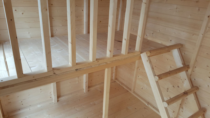 outdoor playhouse with loft